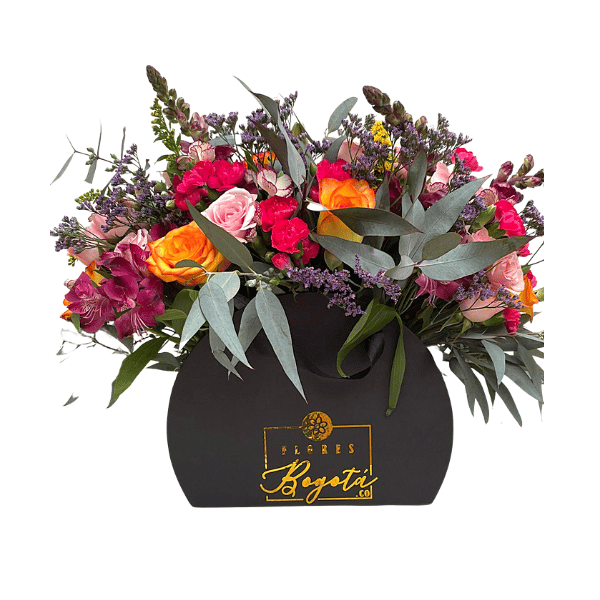 Caja de lujo en forma de bolso con flores de colores en Bogotá